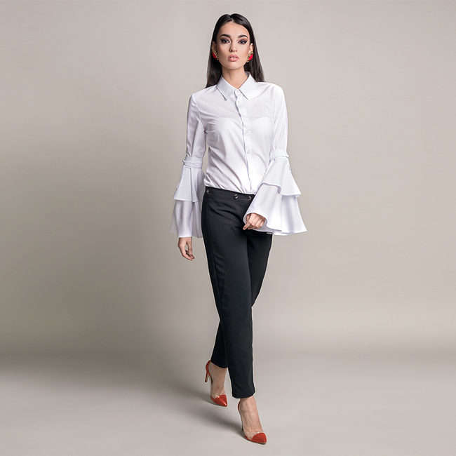 woman posing in a white shirt pattern