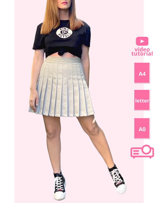 woman posing in a pleated skirt