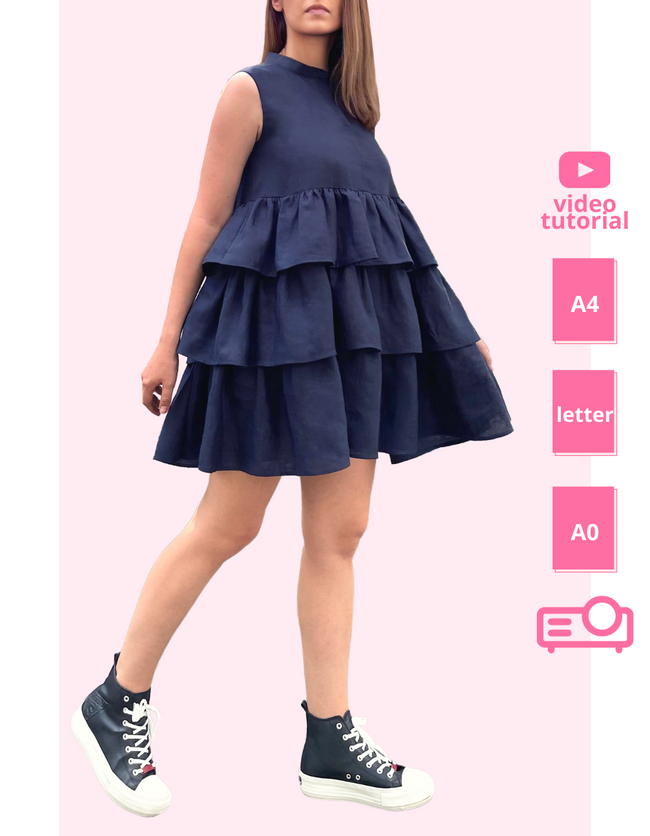 woman posing in a tiered dress