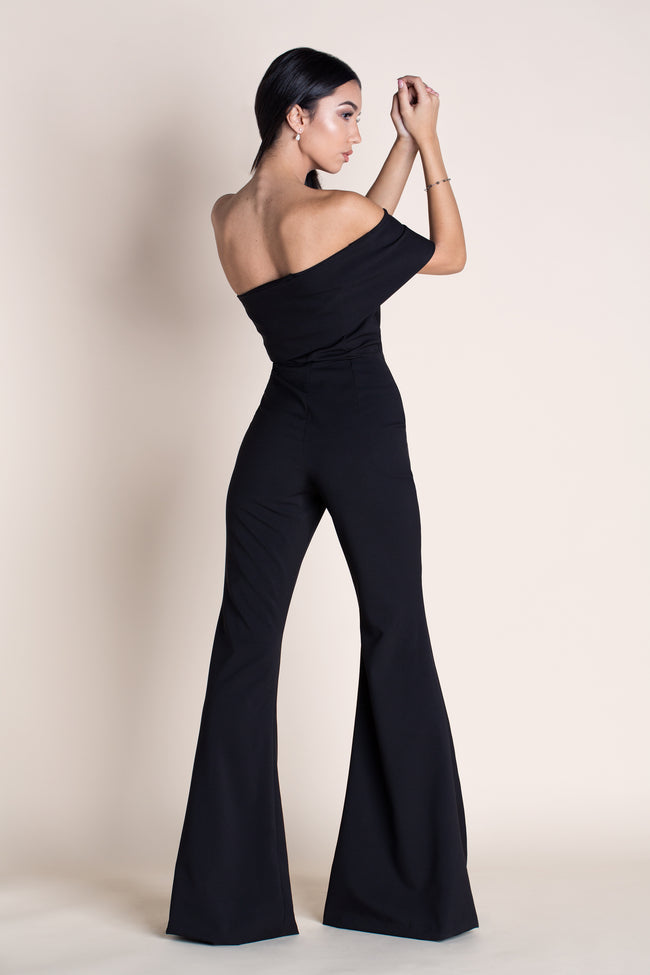 back view of a woman posinng in a diy bodycon jumpsuit pattern