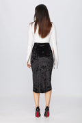 back view of a woman posing in a diy sewn black pencil skirt pattern