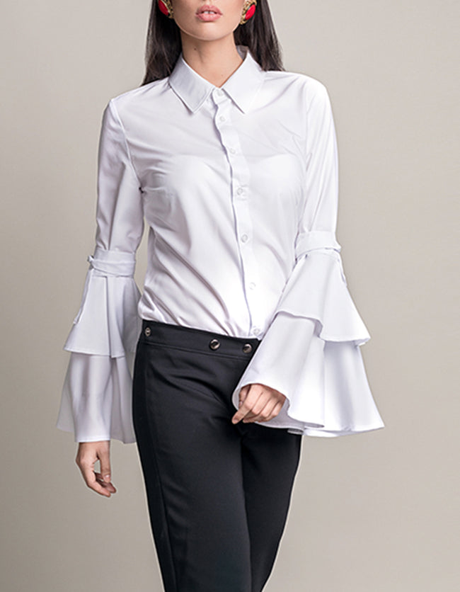 woman posing in a white shirt pattern