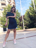 woman sporting a casual denim mini dress