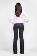 back view of a woman wearing a white shirt pattern