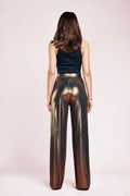 back of woman wearing high waist pants pattern