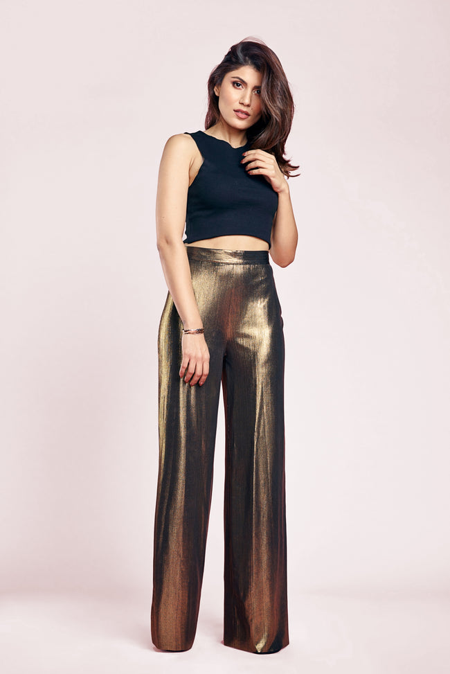 woman posing with a pair of high waist pants pattern