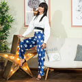 woman wearing a pair of wide leg sweatpants pattern and white shirt