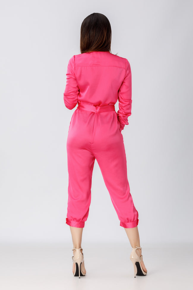 back view of a woman wearing a pink jumpsuitpattern