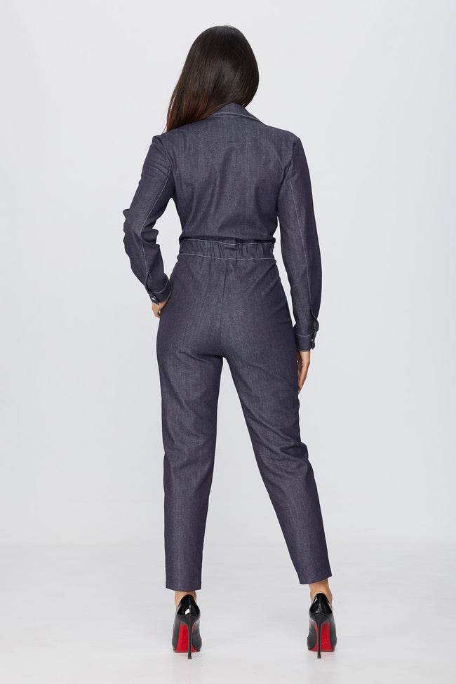 back view of a woman wearing a diy sewn denim jumpsuit pattern