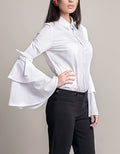 woman wearing a white bell sleeve shirt pattern