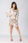 studio shoot of a woman wearing a floral diy sewn midi dress pattern