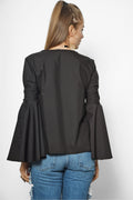 woman wearing a black blouse sewing pattern