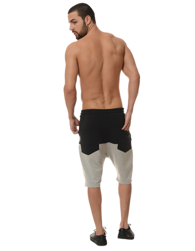 back of a man posing for a pair of shorts