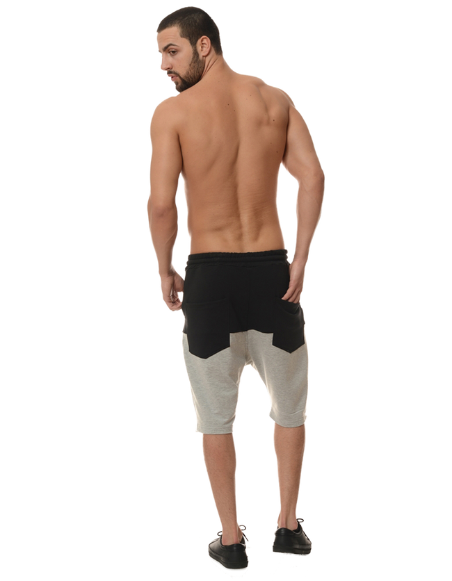 back of a man posing for a pair of shorts