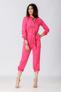 woman wearing a pink jumpsuit pattern