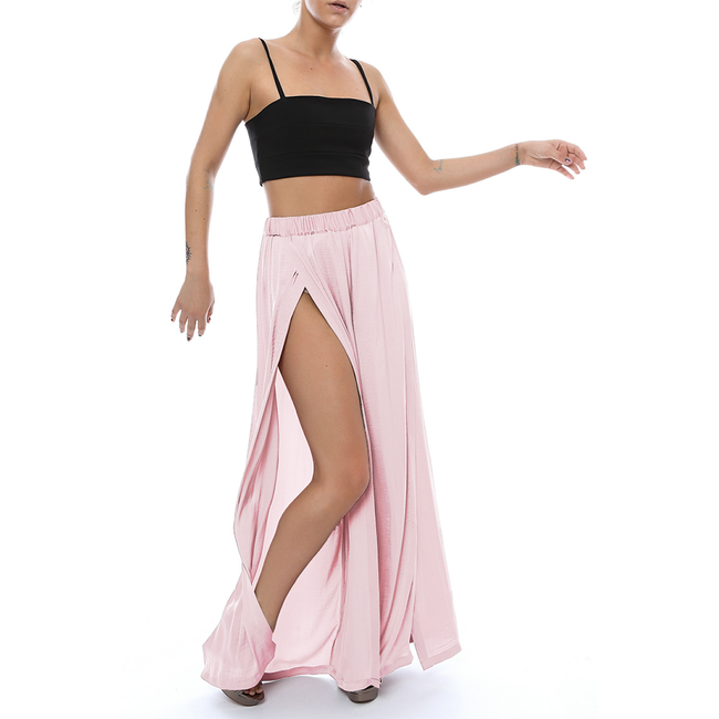 studio photoshoot of a woman in a pink palazzo pants pattern