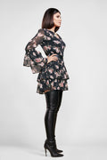 side view of a woman wearing a diy sewn mini dress pattern