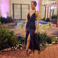 woman posing in a blue satin dress pattern