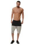 man posing in a pair of shorts