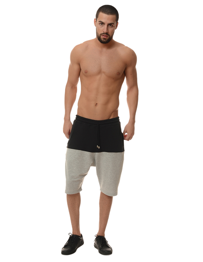 man posing in a pair of shorts
