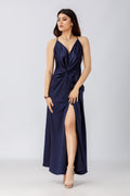 woman posing in a blue satin dress pattern