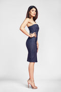 side view of a woman posin in a strapless dress pattern