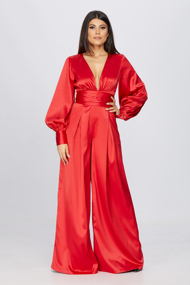 front view of a woman in a red jumpsuit pattern sewing