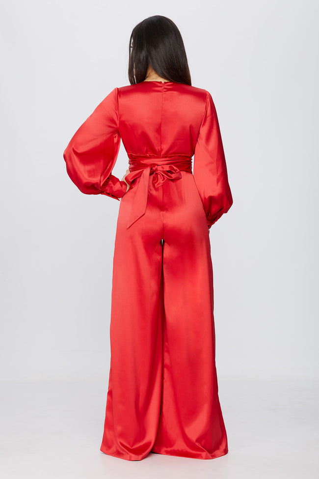 back view of a woman in a red jumpsuit pattern