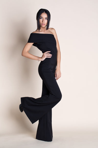 side view of a woman posing in a diy jumpsuit sewing pattern
