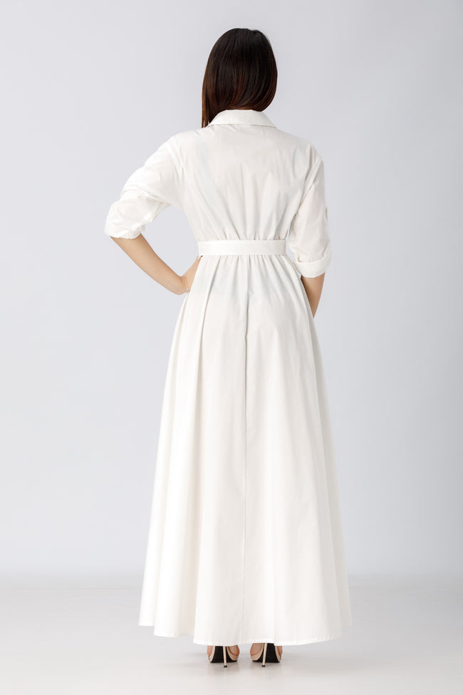back view of a woman wearing a diy sewn white maxi button down shirt dress pattern